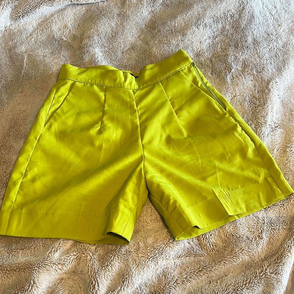 Lime green pleated shorts